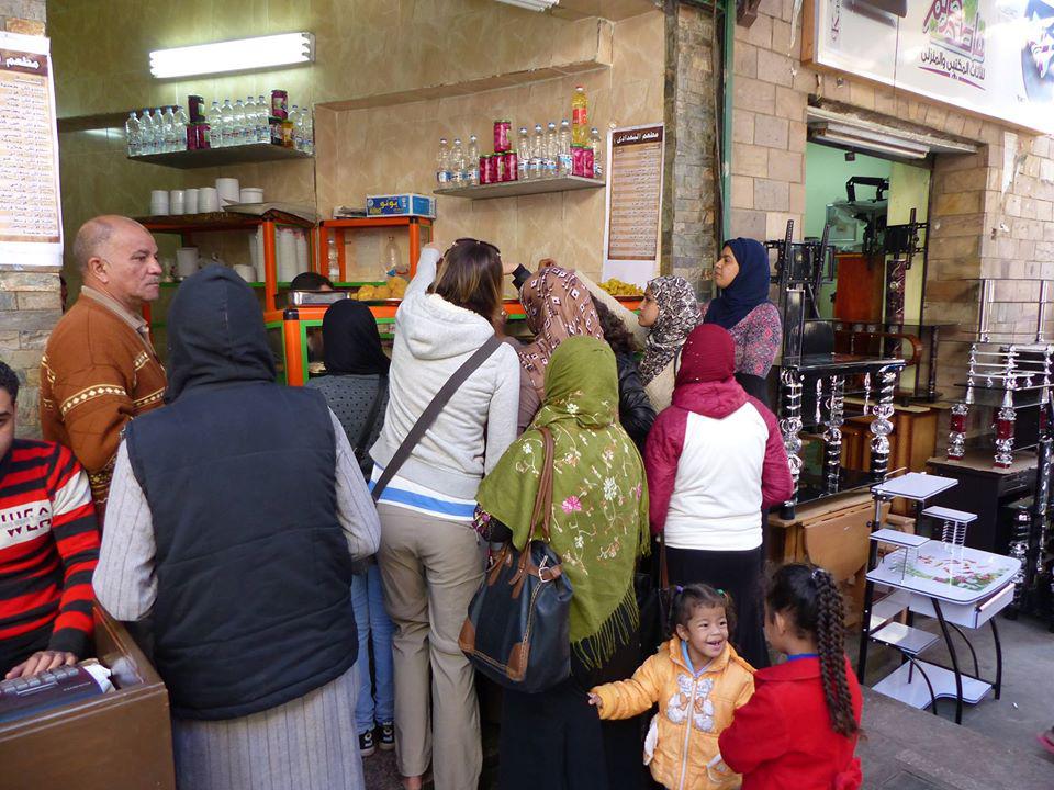 Buying falafel in Aswan Bazaar