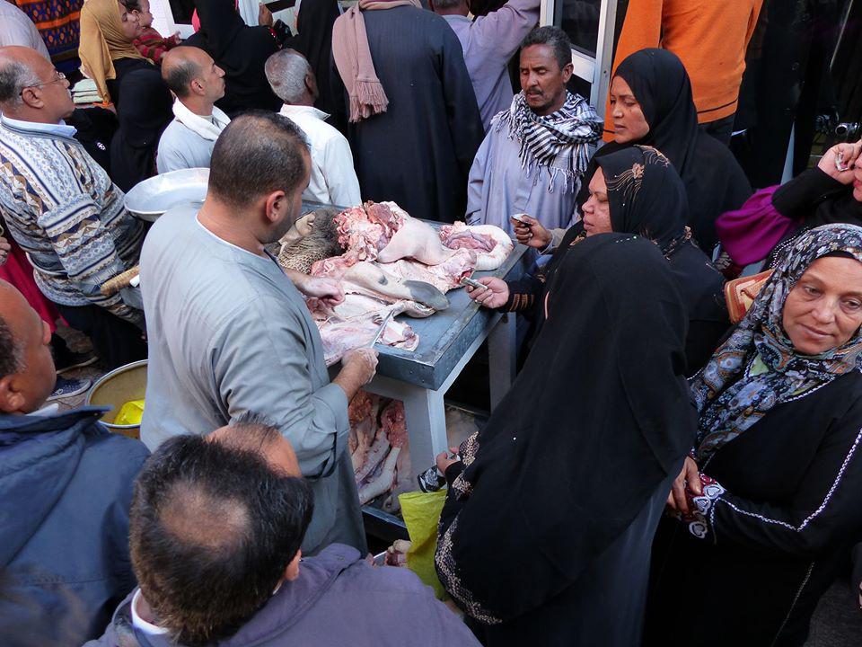 Vendor chopping up a cow head in Aswan Bazaar