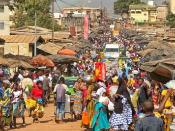 Shopping in the markets, intensely busy markets, in Man, Ivory Coast