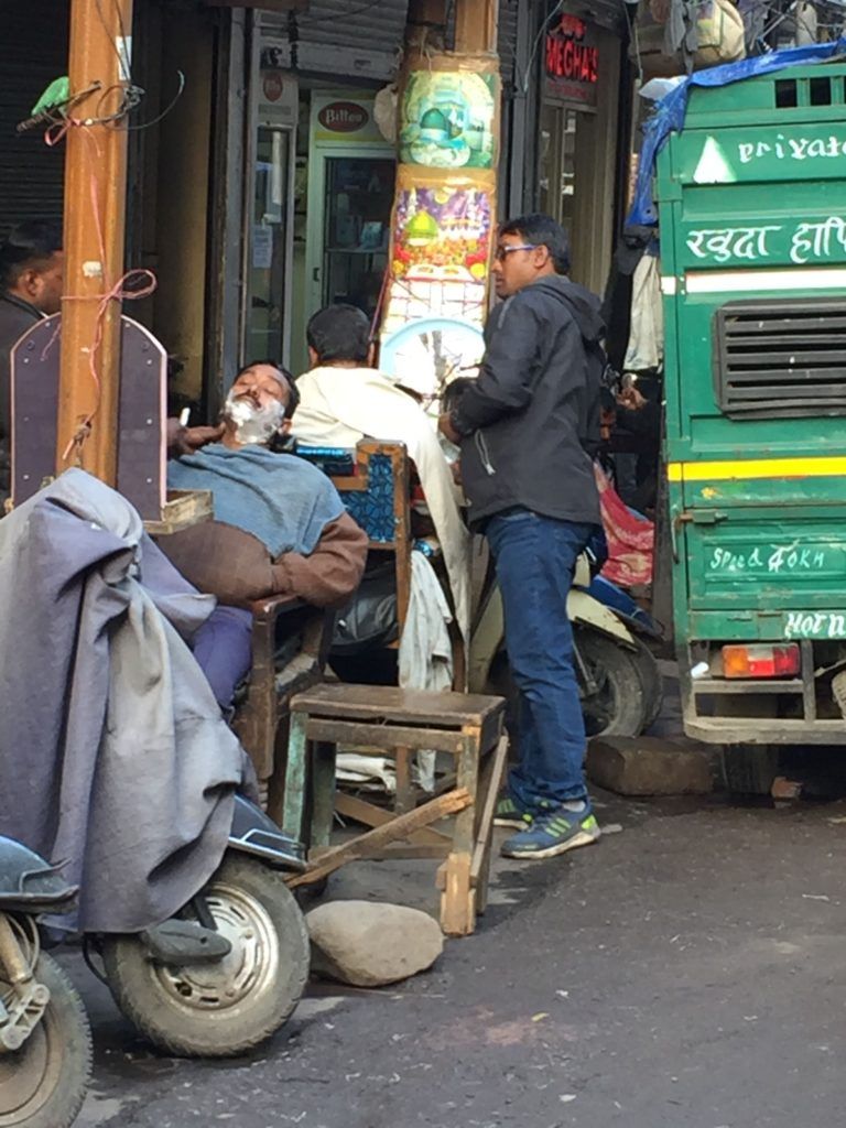 Old Delhi - streetside barber