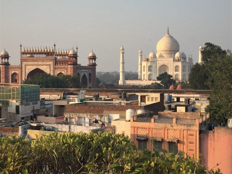 View of the Taj Mahal from a guesthouse rooftop in Agra, India