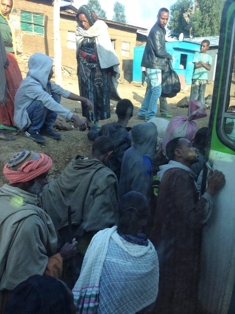 The vastly overcrowded, late and slow bus from Lalibela to Addis Ababa, Ethiopia