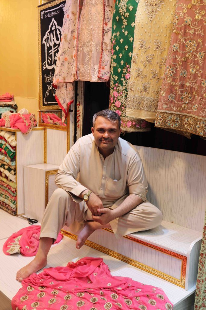 Another photo request from a vendor in the bazaar, Cloth bazaar, Peshawar, Pakistan