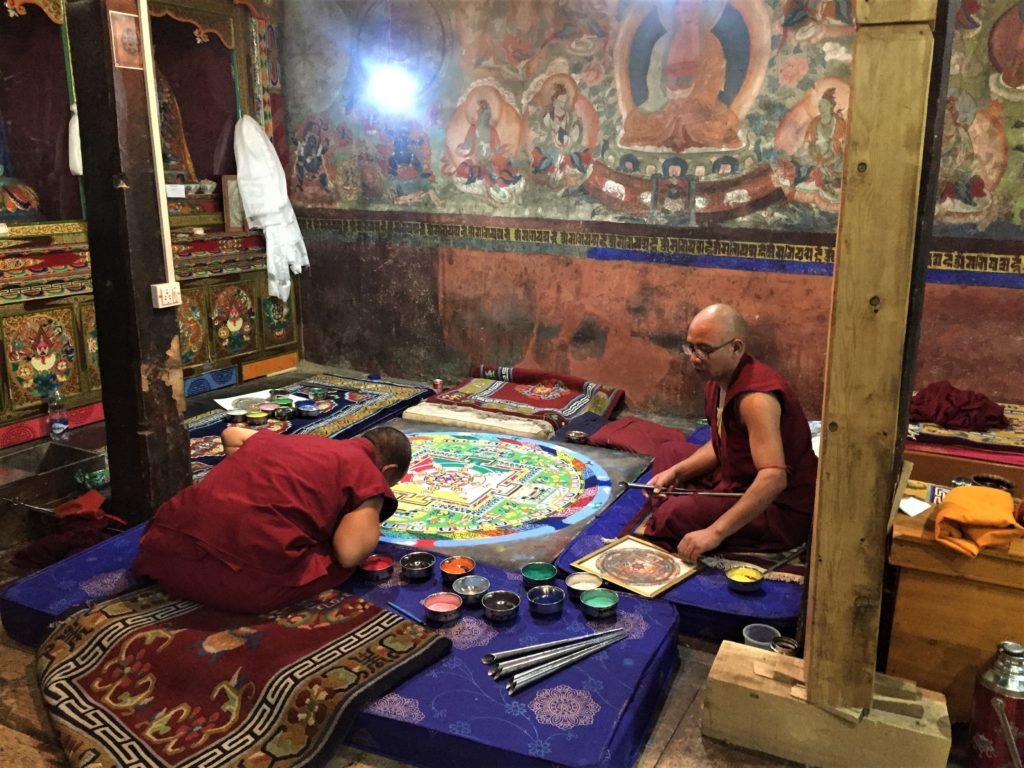 Monks working on a mandala, Thiksey gompa