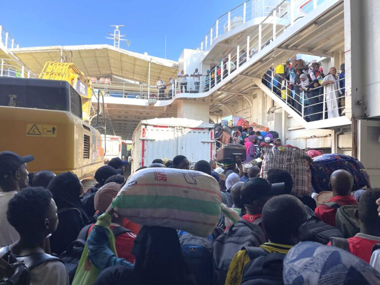 Disembarking the ferry on Pemba