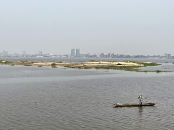 Strolling along the riverfront promenade in Brazzaville with views of Kinshasa