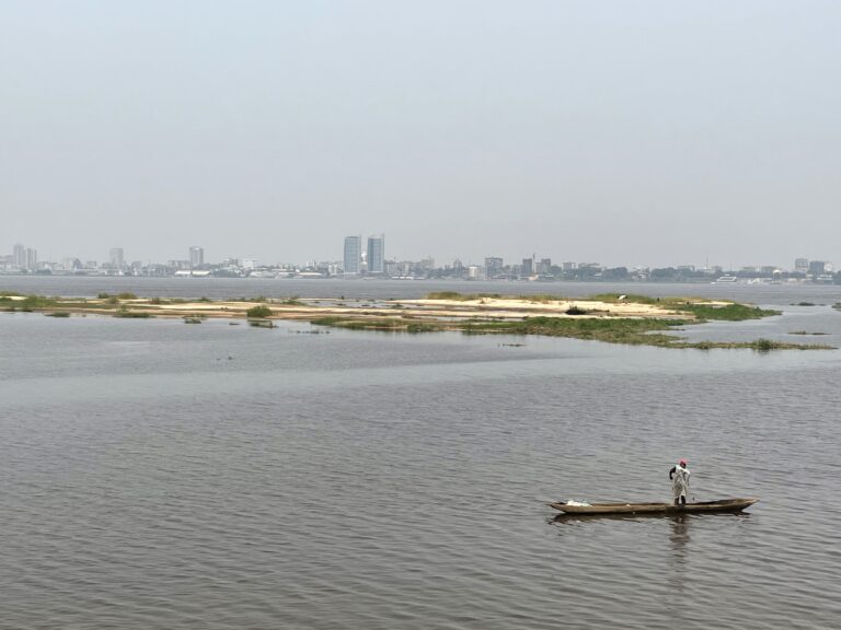 Strolling along the riverfront promenade in Brazzaville with views of Kinshasa