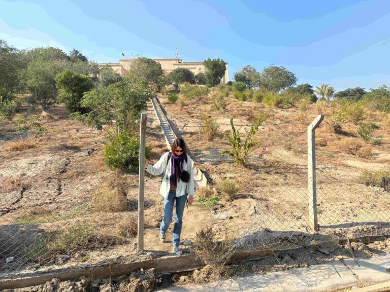 We scrambled back down the hill and through a gap in the first fence, only to find the main fence locked